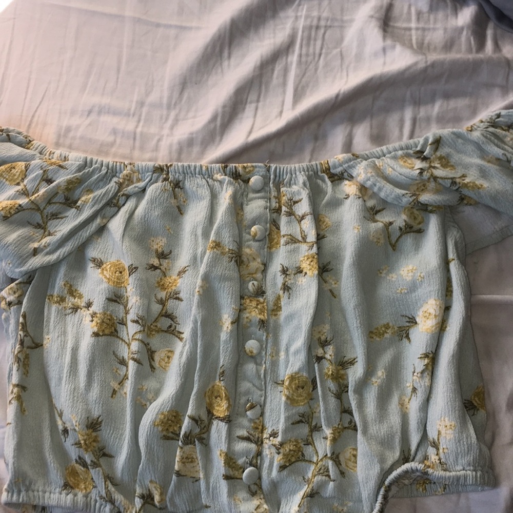 blue crop top with yellow flowers